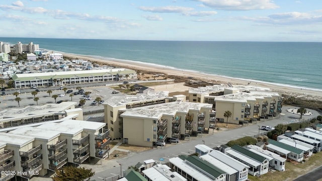 drone / aerial view featuring a view of the beach and a water view