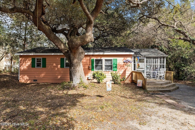 ranch-style house featuring crawl space and a sunroom