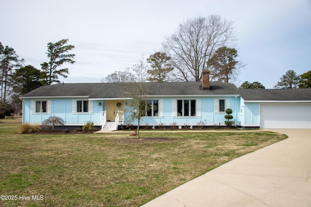 single story home with a front yard, roof with shingles, a chimney, a garage, and driveway