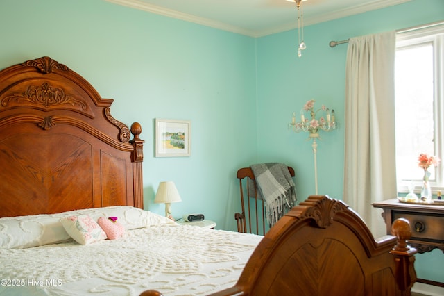 bedroom with ornamental molding