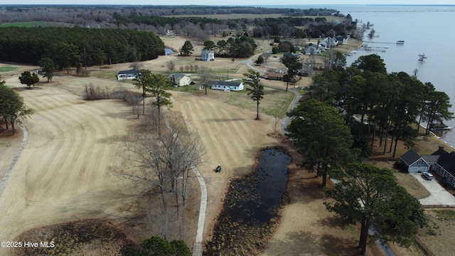 drone / aerial view featuring a water view and a rural view