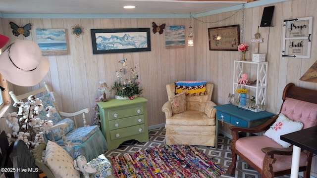 sitting room with wood walls