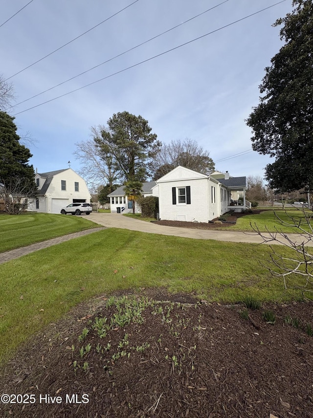 view of home's exterior featuring a yard