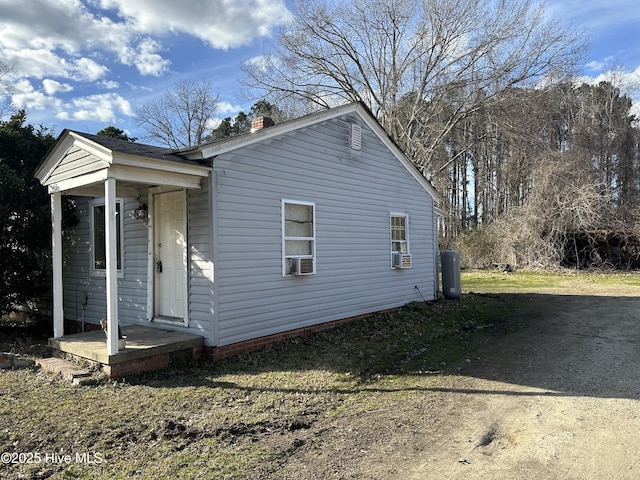 view of front of property with cooling unit