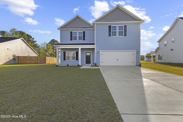 113 Fox Cove Xing, Jacksonville, NC 28546 - traditional-style house featuring driveway, a porch, a garage, and a front yard