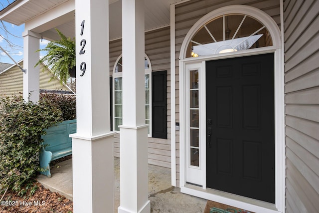 entrance to property with covered porch