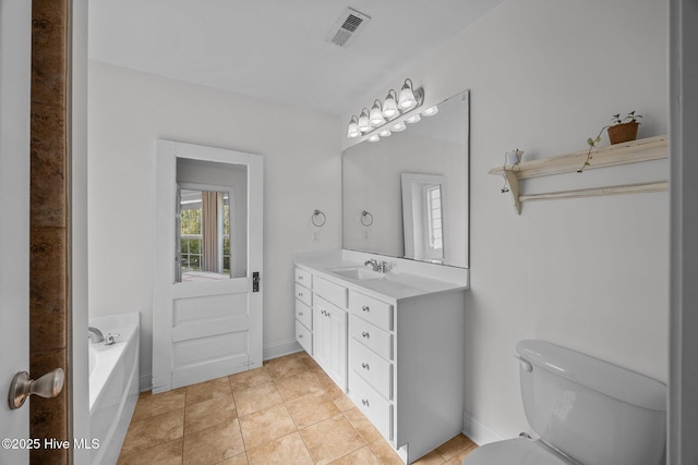 full bath featuring a garden tub, visible vents, toilet, vanity, and tile patterned flooring