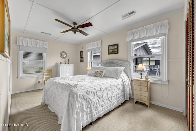 bedroom featuring visible vents, ceiling fan, and baseboards