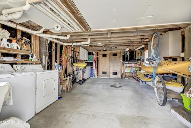 unfinished basement with independent washer and dryer