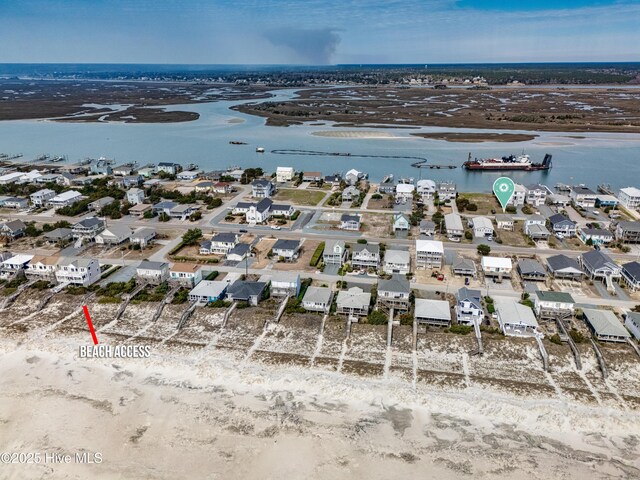 aerial view featuring a water view and a residential view