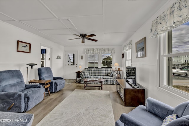 living room with ceiling fan and wood finished floors