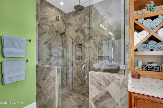 full bathroom with a shower stall