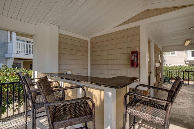 view of patio with outdoor dry bar