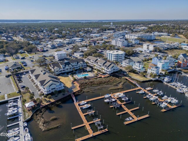 birds eye view of property featuring a water view