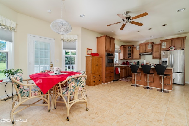 dining area with recessed lighting and ceiling fan