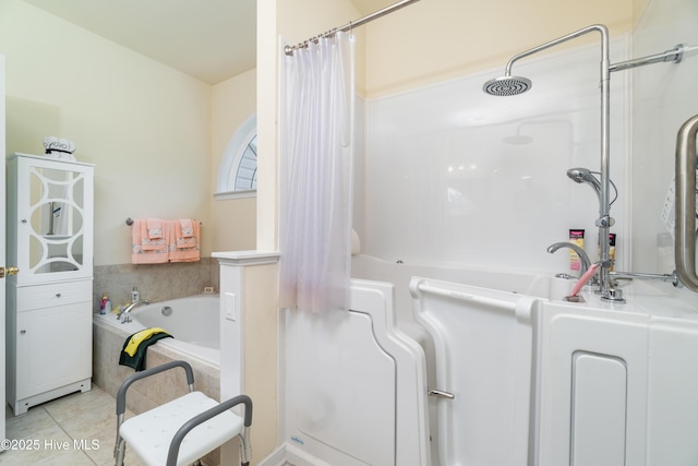 bathroom featuring tile patterned floors, a shower with shower curtain, and tiled tub