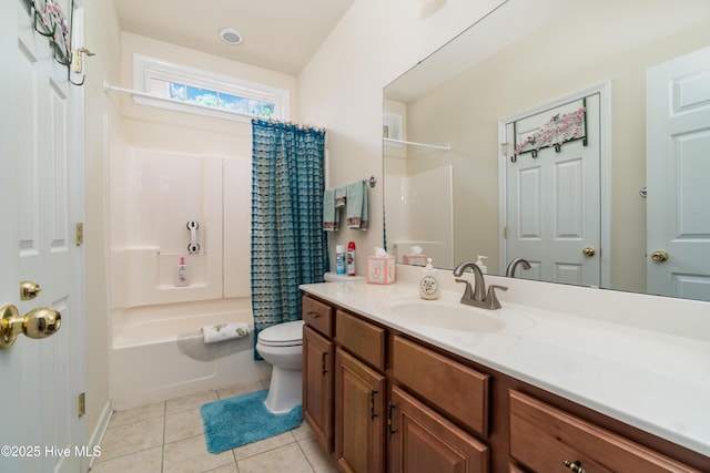 full bathroom featuring tile patterned floors, shower / tub combo, toilet, and vanity