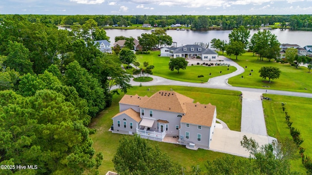 bird's eye view featuring a water view and a wooded view