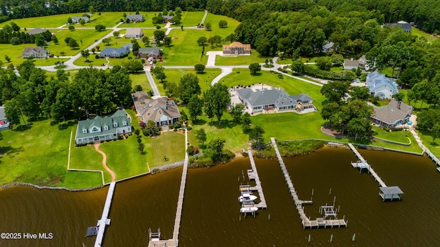 bird's eye view with a residential view and a water view