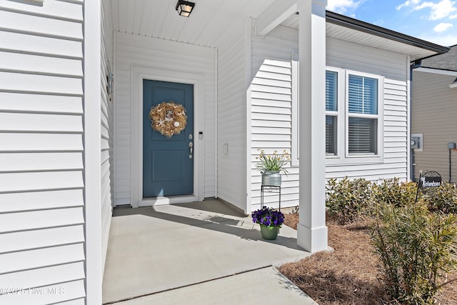 entrance to property with a porch