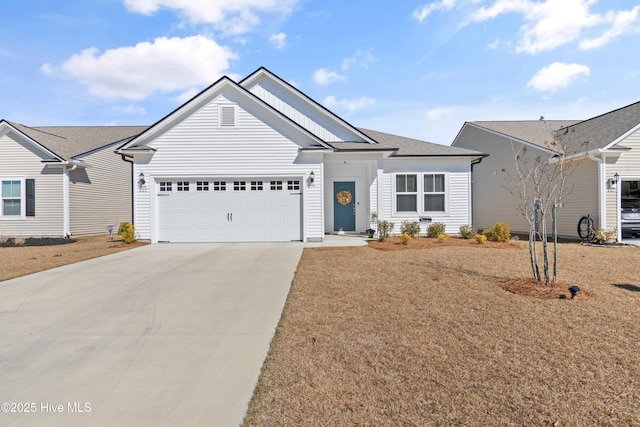 ranch-style home featuring driveway and an attached garage