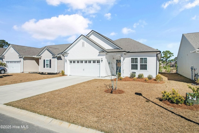 ranch-style home with driveway, a shingled roof, and an attached garage