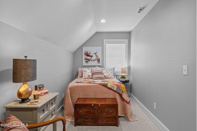 bedroom featuring carpet, visible vents, vaulted ceiling, and baseboards
