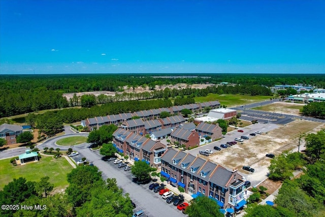 drone / aerial view with a view of trees