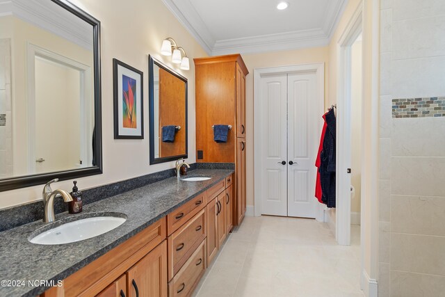 3982 Wyndmere Dr, Southport, NC 28461 - bathroom with double vanity, ornamental molding, and tile patterned floors