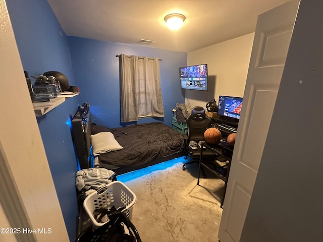 bedroom featuring visible vents