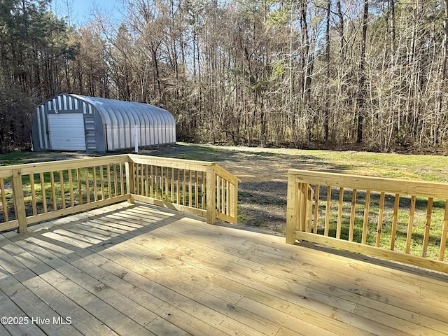 wooden terrace with an outdoor structure