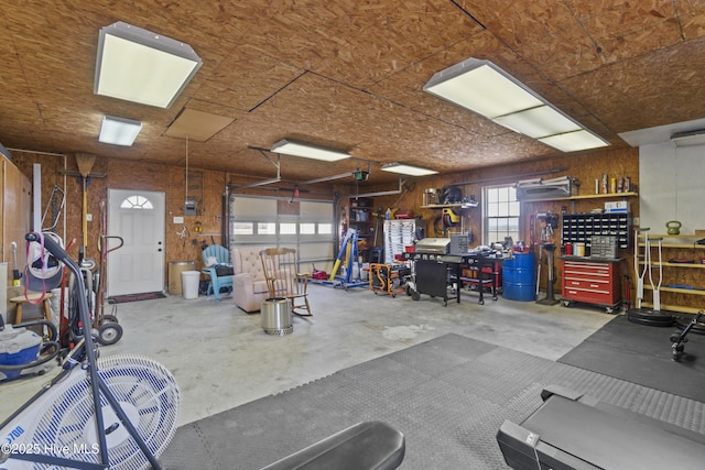 garage with a workshop area