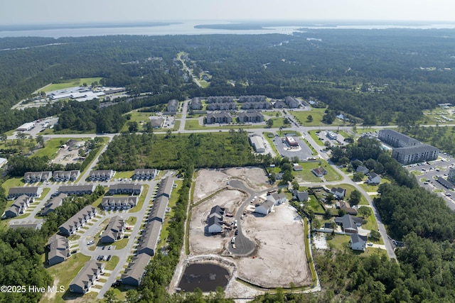 211 Sandpiper Pl, Holly Ridge, NC 28445 - aerial view of property's location featuring a heavily wooded area