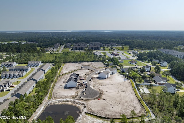 211 Sandpiper Pl, Holly Ridge, NC 28445 - aerial overview of property's location with nearby suburban area and a large body of water