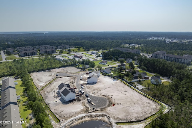 211 Sandpiper Pl, Holly Ridge, NC 28445 - aerial view of property's location with a heavily wooded area