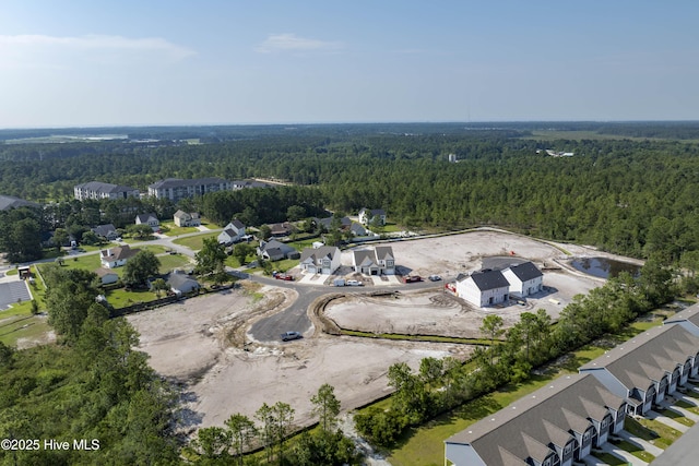 211 Sandpiper Pl, Holly Ridge, NC 28445 - aerial view of property's location with a forest and nearby suburban area