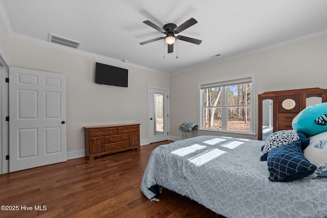 bedroom featuring baseboards, visible vents, ornamental molding, wood finished floors, and access to exterior