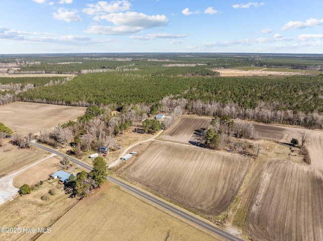 birds eye view of property featuring a rural view