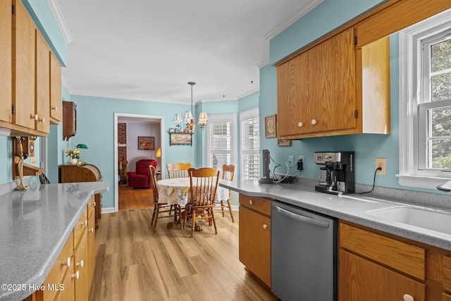 kitchen featuring dishwasher, light countertops, ornamental molding, and light wood-style flooring