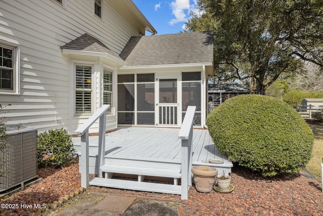 deck with central AC and a sunroom