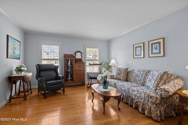 living room with plenty of natural light, baseboards, and wood finished floors