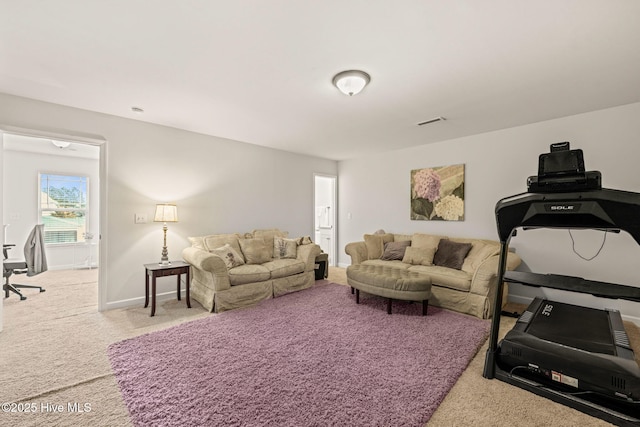 63 Radcliffe Ct, Clayton, NC 27527 - carpeted living area with baseboards and visible vents
