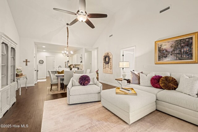 63 Radcliffe Ct, Clayton, NC 27527 - living room with visible vents, baseboards, wood finished floors, and high vaulted ceiling
