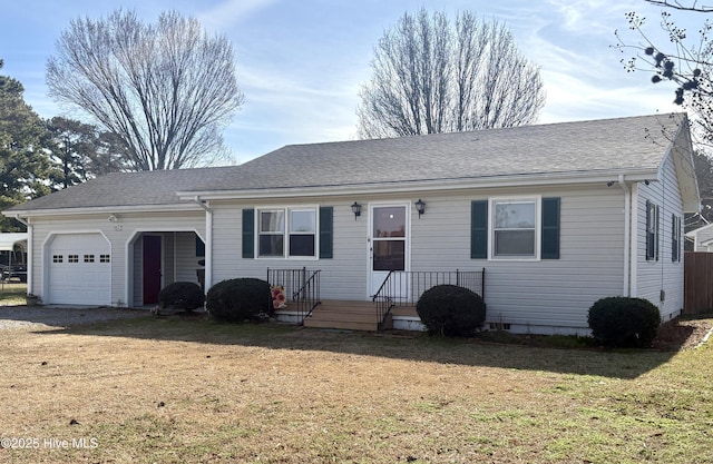 ranch-style house with a garage, a front yard, crawl space, and a shingled roof