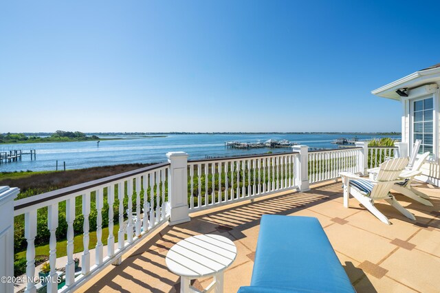 view of patio / terrace with a water view