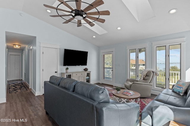 living room featuring dark wood-style floors, recessed lighting, a skylight, and a ceiling fan