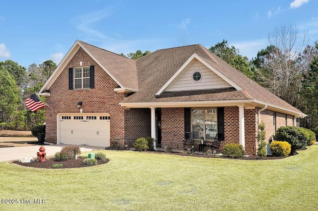 traditional-style home featuring brick siding, roof with shingles, covered porch, a front yard, and driveway