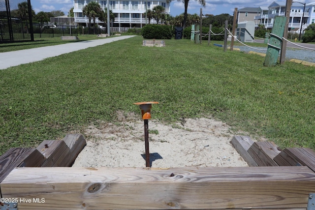 220 W Dolphin Dr, Oak Island, NC 28465 - view of grassy yard