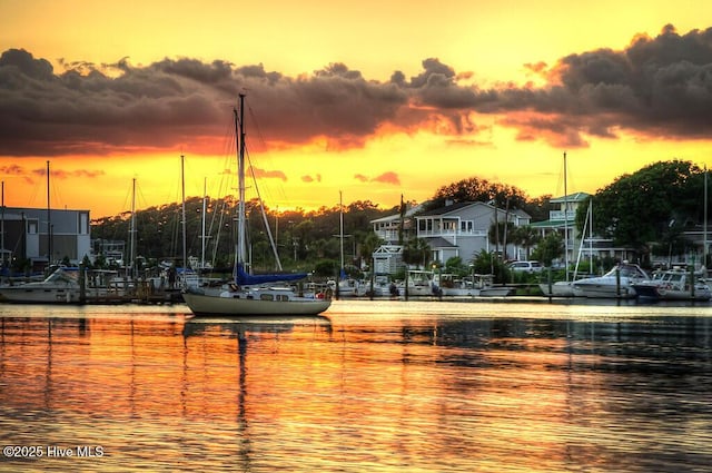 220 W Dolphin Dr, Oak Island, NC 28465 - water view with a dock