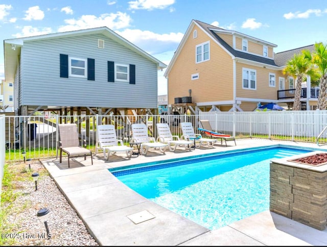 220 W Dolphin Dr, Oak Island, NC 28465 - view of pool with fence and a patio area